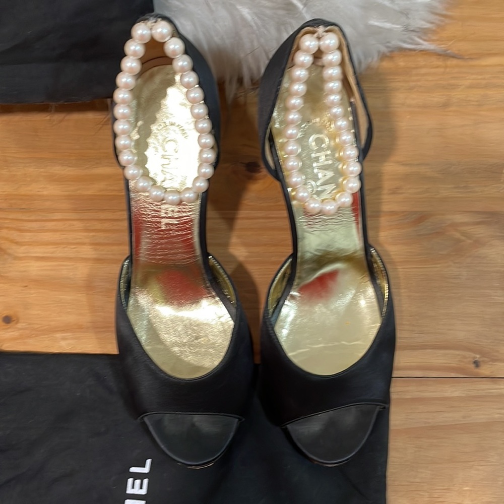 CHANEL
Black Satin Open Toe White Pearl Ankle Strap Heels Size 39 1/2